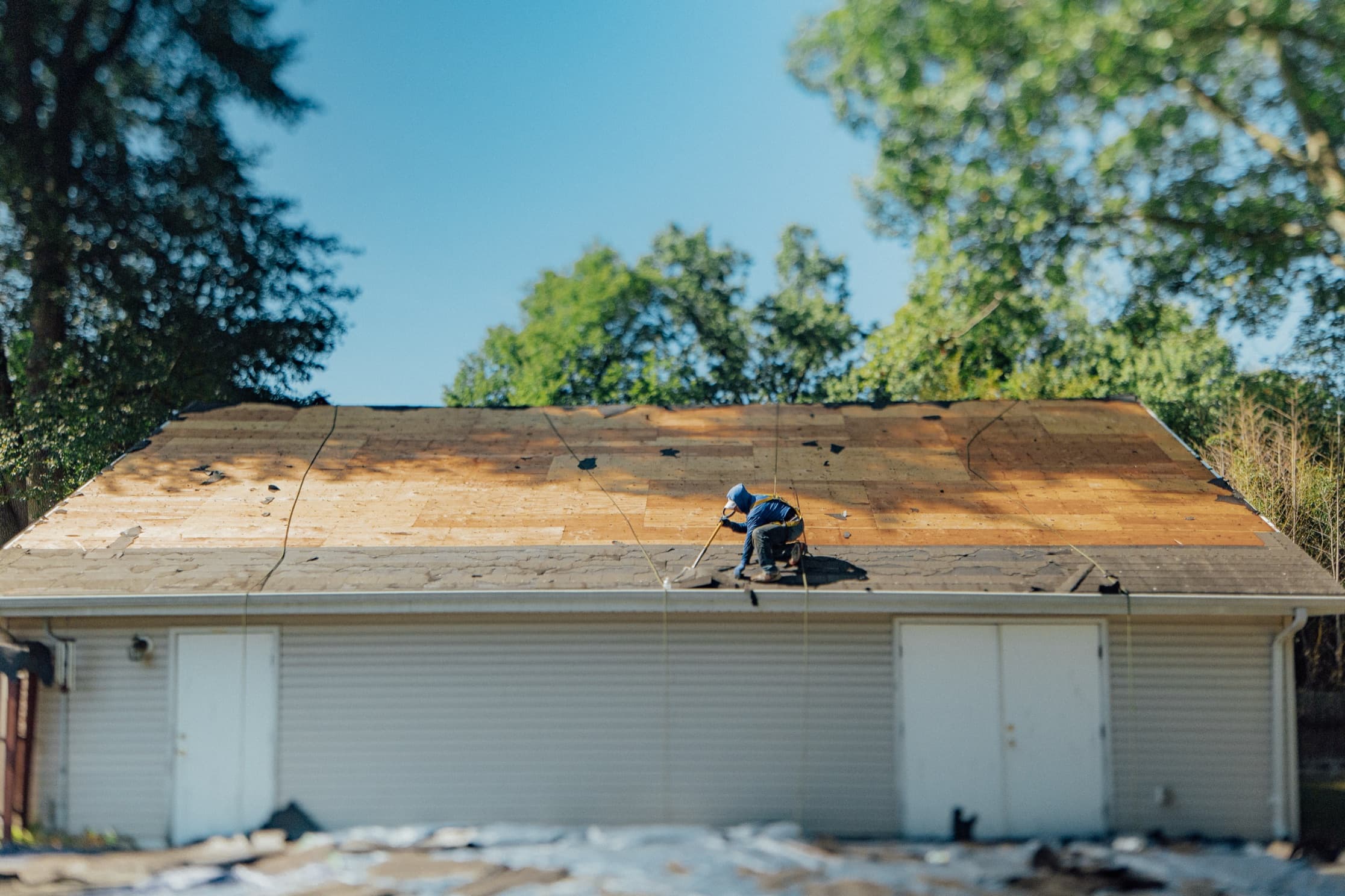 Remi roofing professional working on a roof